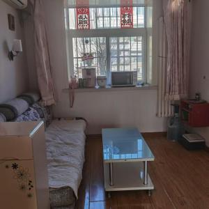 出租新盛小区56型二楼精装1300元包采暖，家电家具齐全，特